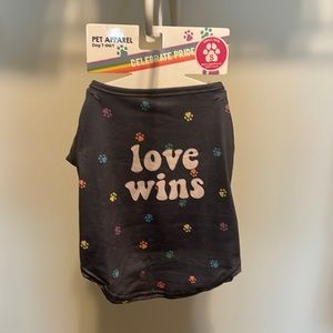 Celebrate Pride Pet Apparel. Grey. Multi colored puppy prints. Pink ”love wins”
